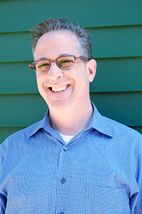 Image is a headshot of Lenny Goldstein