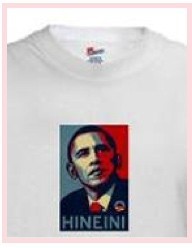 Image is of a white t-shirt with a stylized headshot of Barack Obama on it. Underneath his face, text says "Hineini."
