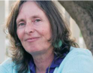 Image of Ayala Katz wearing a blue shirt and smiling.