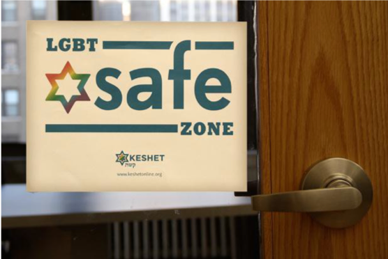 Image of a Keshet "LGBT Safe Zone" sticker on a door.