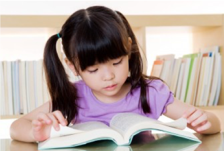 Image of young girl reading a book.