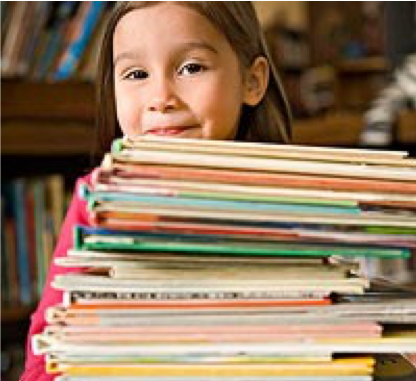 Image of a child holding a large stack of books.