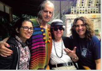 Image of Faith Soloway and Jeffrey Tambor standing with two other people, smiling.