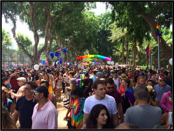 Image of a Tel Aviv Pride Parade filled with lots of people.