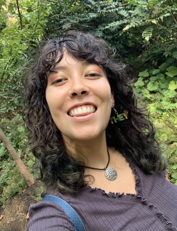 An image of a Black Jewish woman smiling