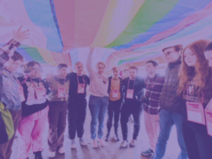 rainbow flag and Keshet Shabbaton participants