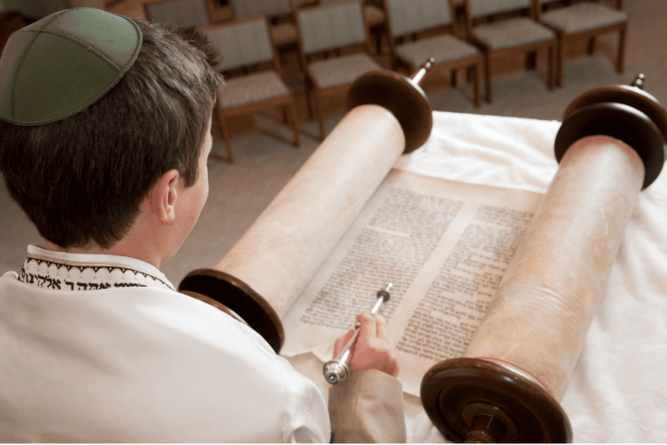 B'mitzvah student reading from the Torah